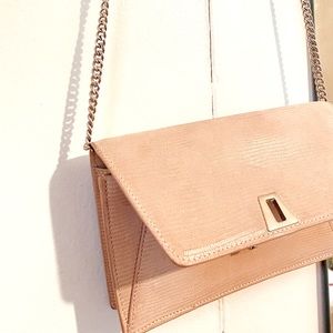 AKRIS crossbody bag with silver detailing.